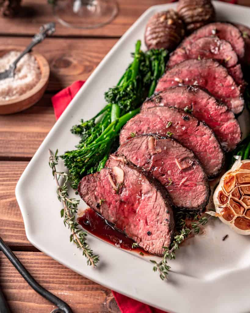 Garlic Thyme Studded Beef Tenderloin Roast With Red Wine Sauce Cooking With Wine Blog